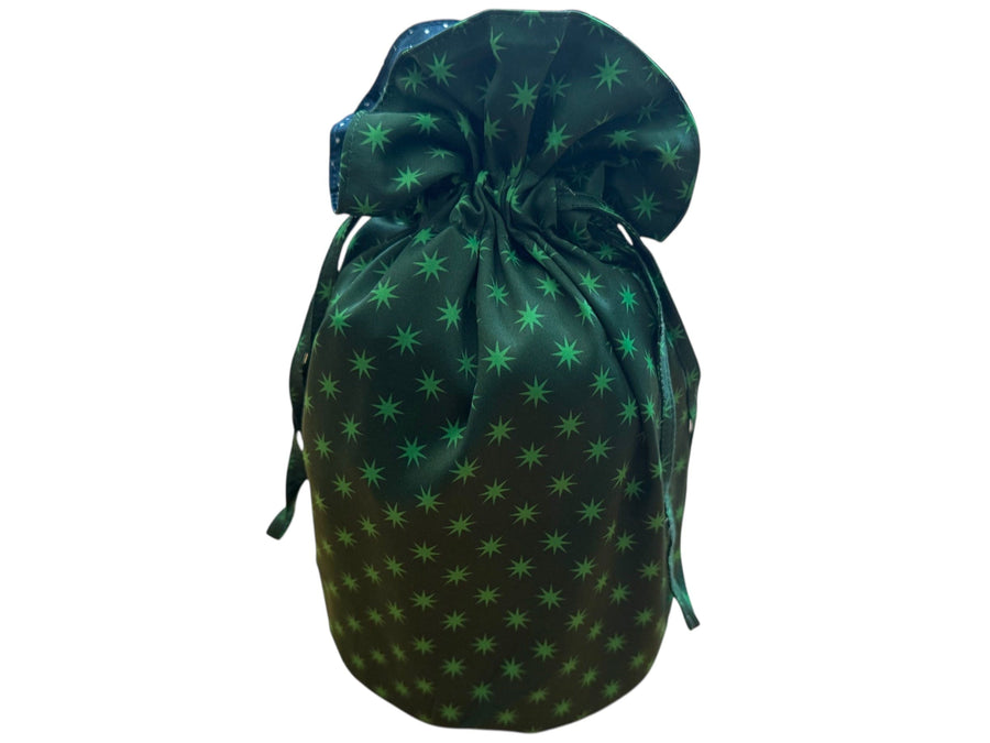 Green drawstring bag with star pattern on a white background